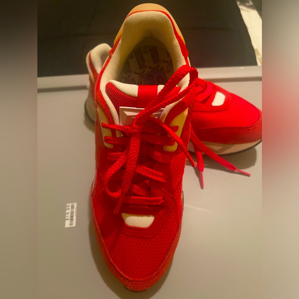 Red PUMA sneakers